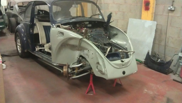 Genuine VW front quarters and valance were used. Lining the new parts up